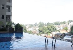 Hồ bơi 4 Cozy 2BR Apartment with Direct Access to Pool at Parahyangan Residence By Travelio