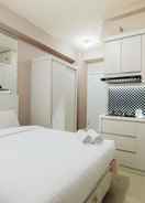 BEDROOM Deluxe Studio Green Pramuka City a Serene Apartment Living By Travelio