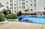 Swimming Pool 6 Comfortable Studio at Bassura Apartment near to Bassura Mall By Travelio