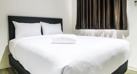 Bedroom 2 Homey and Cozy Studio Room Bintaro Icon Apartment By Travelio