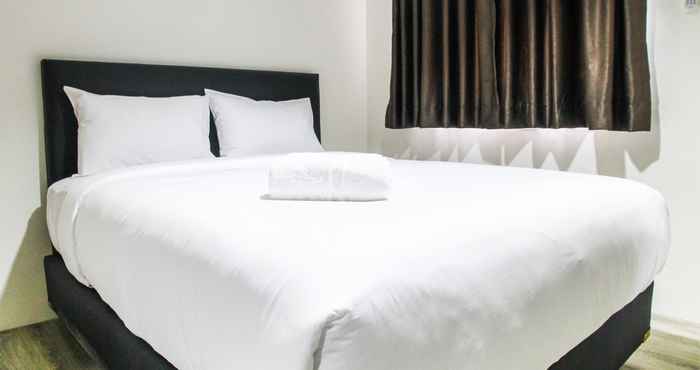 Kamar Tidur Homey and Cozy Studio Room Bintaro Icon Apartment By Travelio