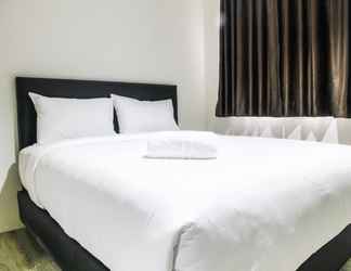 Bedroom 2 Homey and Cozy Studio Room Bintaro Icon Apartment By Travelio