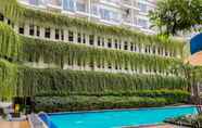 Swimming Pool 4 Luxurious Studio at Bintaro Plaza Residence Apartment By Travelio