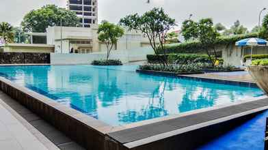 Swimming Pool 4 Luxurious Studio at Bintaro Plaza Residence Apartment By Travelio