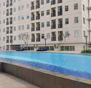 Swimming Pool 2 Stylish and Comfy 2BR Apartment at Ayodhya Residences By Travelio