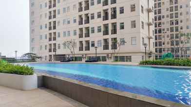 Swimming Pool 4 Stylish and Comfy 2BR Apartment at Ayodhya Residences By Travelio