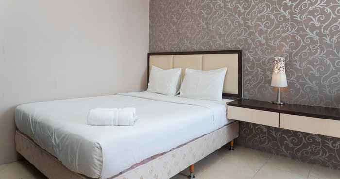 ห้องนอน Cozy 1BR + 1 Apartment at Seasons City By Travelio