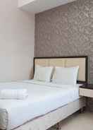 BEDROOM Cozy 1BR + 1 Apartment at Seasons City By Travelio