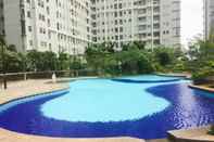 Kolam Renang Cozy 1BR + 1 Apartment at Seasons City By Travelio