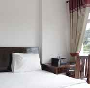 Bedroom 2 Homey Studio at Gateway Pasteur Apartment near Exit Toll By Travelio