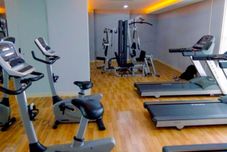 Fitness Center Cozy 2BR at Bassura City Apartment near Mall By Travelio