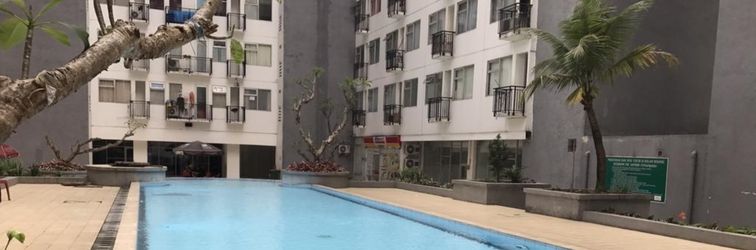 Lobby Homey 2BR at The Jarrdin Cihampelas Apartment By Travelio