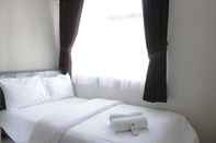 Bedroom Homey 2BR at The Jarrdin Cihampelas Apartment By Travelio