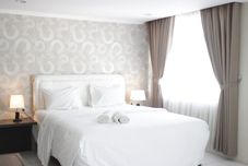 Kamar Tidur Spacious Studio Apartment at The Jarrdin Cihampelas By Travelio