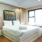 BEDROOM Modern and Cozy Studio Apartment at Belmont Residence Puri By Travelio