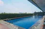 Kolam Renang 3 Modern and Cozy Studio Apartment at Belmont Residence Puri By Travelio