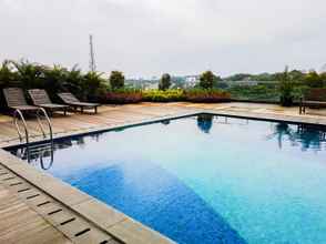 Swimming Pool 4 Relax and Cozy Studio Room at Tree Park BSD Apartment By Travelio