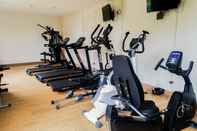 Fitness Center Relax and Cozy Studio Room at Tree Park BSD Apartment By Travelio