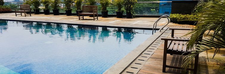 Lobby Wonderful Living Studio at Tree Park Apartment By Travelio