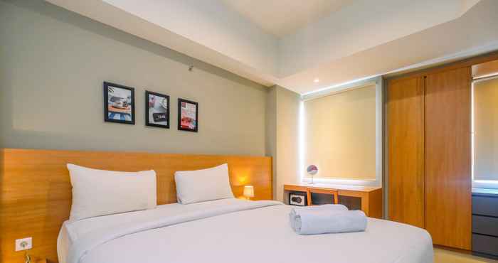 Bedroom Luxury 1BR Apartment at Mustika Golf Residence with Golf View By Travelio