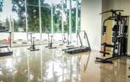 Fitness Center 4 Good Location 1BR at Woodland Park Apartment By Travelio