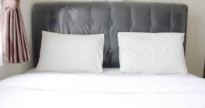 Bedroom Spacious and Convenient 2BR at Tamansari Panoramic Apartment by Travelio