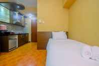 Bedroom Strategic Studio Apartment at Taman Melati near Universitas Indonesia By Travelio