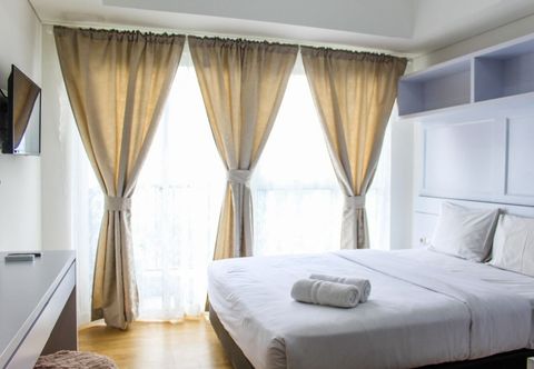 Bedroom Stylish Studio Apartment at Casa De Parco By Travelio