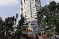 Bangunan Posh and Minimalist Studio Parkland Avenue Apartment By Travelio