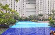 Kolam Renang 3 Sea View Modern 2BR Apartment at Green Bay Condominium By Travelio