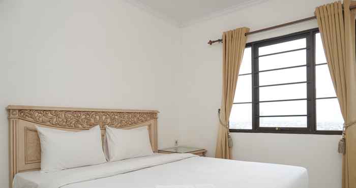 Bedroom Sophisticated 3BR at Puri Garden Apartment By Travelio