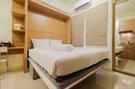 Bedroom Modern Studio at Green Pramuka Apartment with Mall Access By Travelio