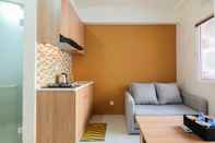 Common Space Near Shopping Mall 2BR at Green Pramuka City Apartment By Travelio