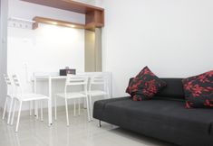 Common Space 2 Pleasant and Comfort 1BR Apartment with Sofa Bed at Dago Suites By Travelio