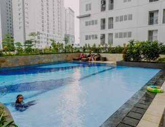 Swimming Pool 2  Fully Furnished and Simply Style 2BR Bassura City Apartment By Travelio