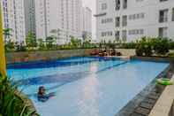 Swimming Pool  Fully Furnished and Simply Style 2BR Bassura City Apartment By Travelio