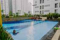 Swimming Pool Comfortable and Big 2BR Bassura City Apartment By Travelio