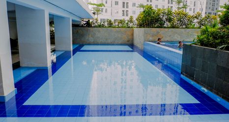 Swimming Pool 2 Exclusive and Good 2BR Bassura City Apartment By Travelio
