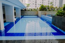 Swimming Pool Exclusive and Good 2BR Bassura City Apartment By Travelio