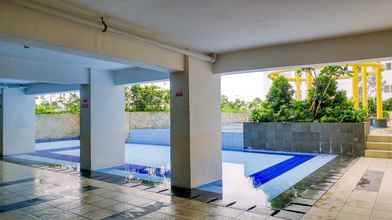 Swimming Pool 4 Exclusive and Good 2BR Bassura City Apartment By Travelio