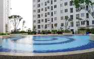 Swimming Pool 6 2BR Homey and Pleasant Apartment at Bassura City near Mall By Travelio 