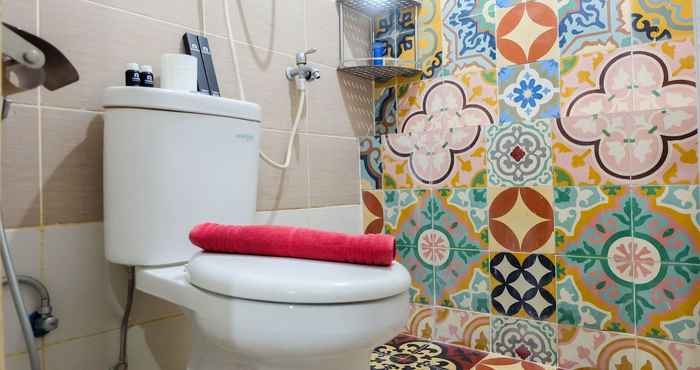 In-room Bathroom Compact Homey 2BR Bassura City Apartment By Travelio