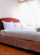 BEDROOM Cozy with Best Location 2BR Green Pramuka Apartment By Travelio