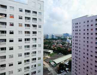 Exterior 2 Homey and Easy Access to Mall 2BR Green Pramuka Apartment By Travelio