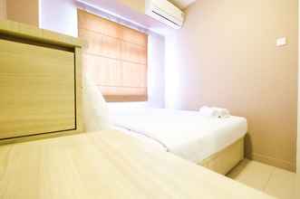 Bedroom 4 Homey and Easy Access to Mall 2BR Green Pramuka Apartment By Travelio