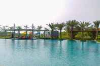 Swimming Pool 1BR with Sea View at Gold Coast Apartment near PIK By Travelio
