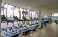 Fitness Center 3 1BR with Sea View at Gold Coast Apartment near PIK By Travelio