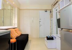 Lobby 2 Modern Living 2BR with City View at Bassura Apartment By Travelio