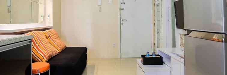 Lobby Modern Living 2BR with City View at Bassura Apartment By Travelio