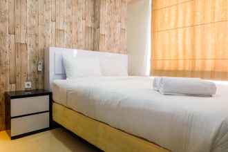 Bedroom 4 Modern Living 2BR with City View at Bassura Apartment By Travelio